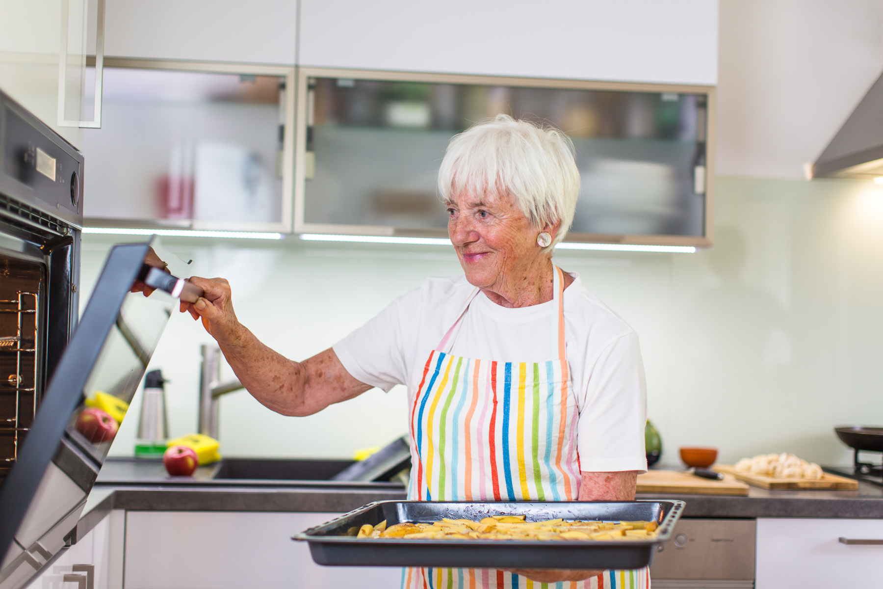Senior Woman Cooking In The Kitchen   Eating And Cooking Healthy